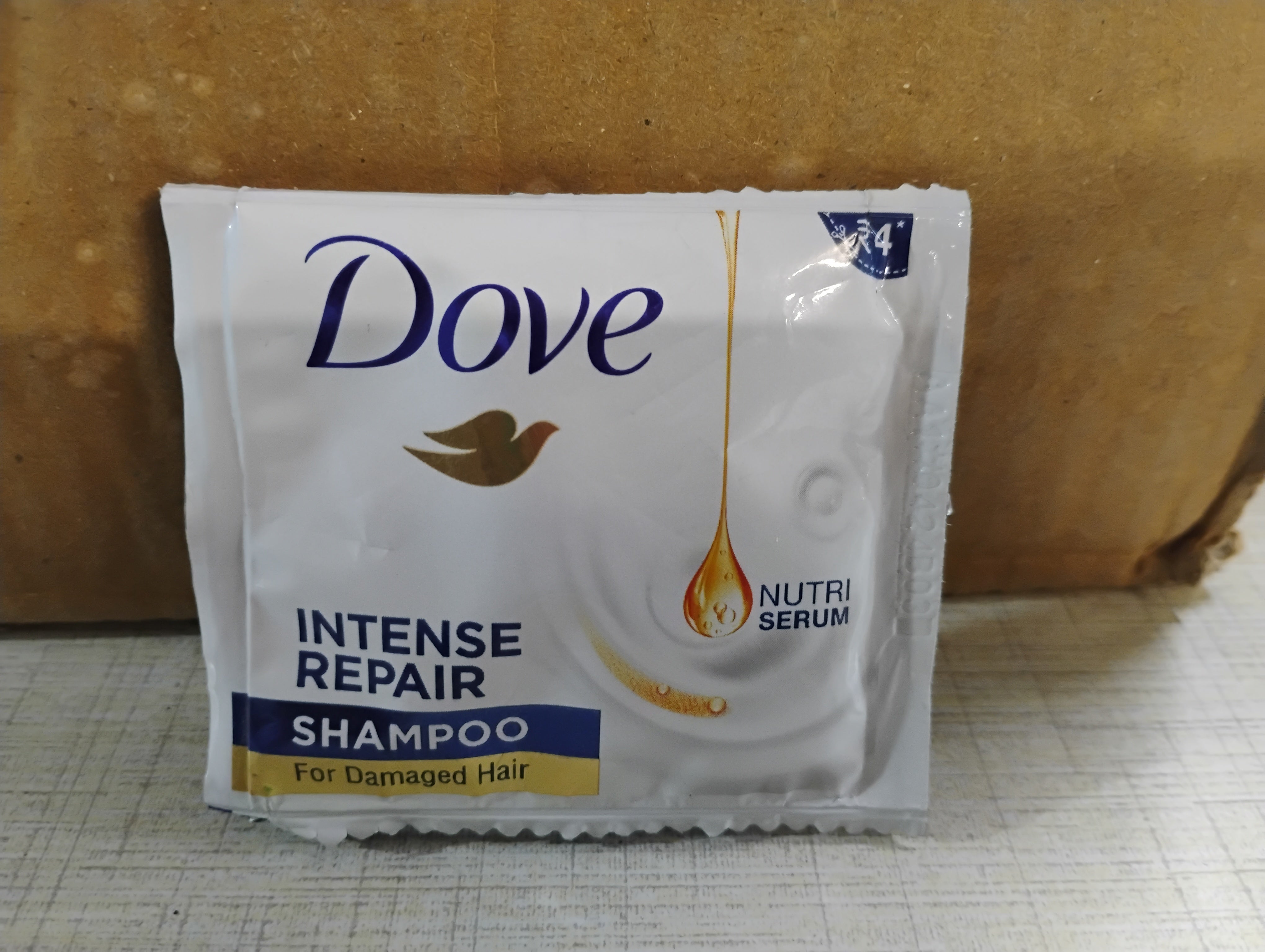 DOVE INTENSE REPAIR SHAMPOO POUCH 7.5MLX768PCS MRP 3072/-(4X768n)